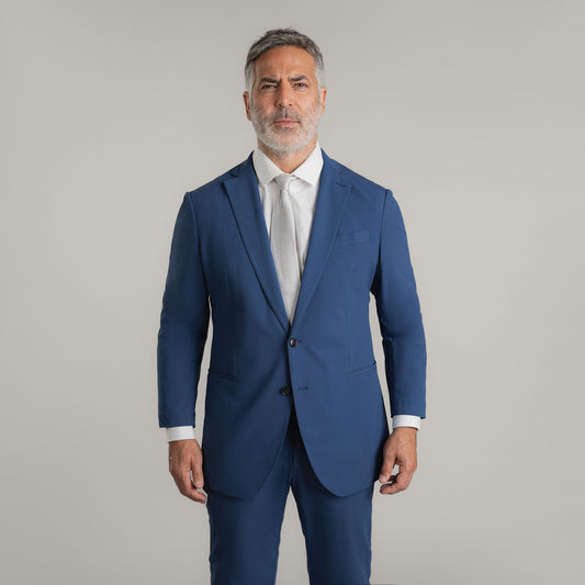Tags:(5'11"|176 lbs) Bespoke custom athleisure technical athletic stretch suit los angeles model Guillermo in Italian Blue